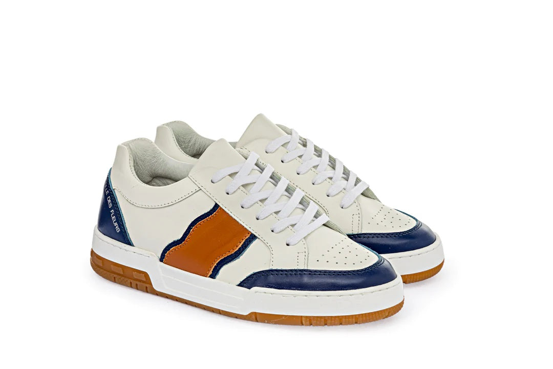 Pair of La Fille des Fleurs women's sneakers with colorful floral design and white laces, casual footwear for women.