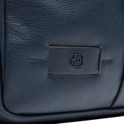 Unisex Piquadro Zaino porta PC 13" in black with multiple compartments and padded straps, designed for tech and everyday use.