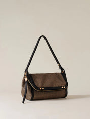 Small Borbonese crossbody bag with a structured frame, leather strap, and minimalist design, perfect for casual or formal wear.