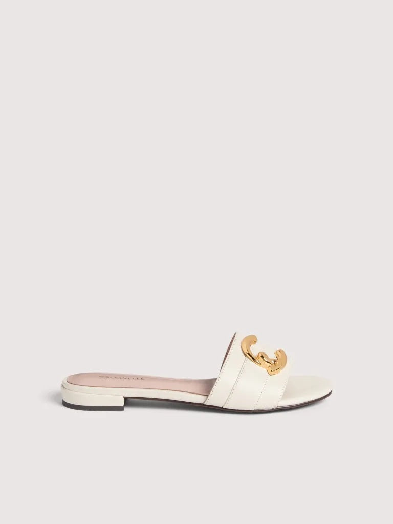 Coccinelle C-Me women's sandal with tan leather straps and open toe, showcasing stylish summer footwear.