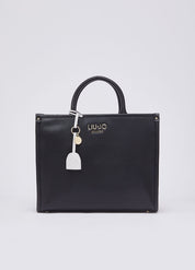 Liu Jo Ridhi women's hand bag in beige leather with gold accents, featuring a sleek, structured design and top handle.