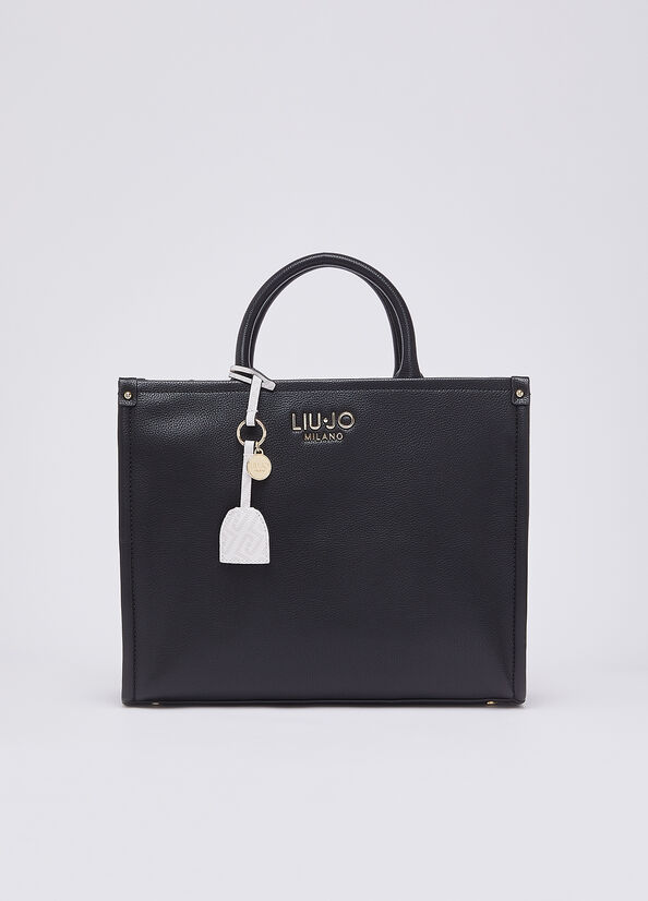 Liu Jo Ridhi women's hand bag in beige leather with gold accents, featuring a sleek, structured design and top handle.