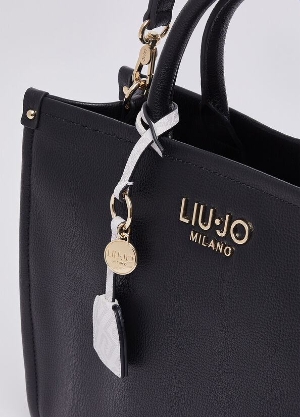Liu Jo Ridhi women's hand bag with leather exterior, double handles, and silver hardware, stylish accessory for women.