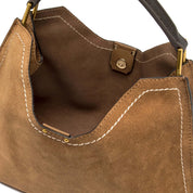 Elegant Gianni Chiarini Aurora hand bag in beige leather, featuring sleek design and top handle, suitable for stylish women's accessories.
