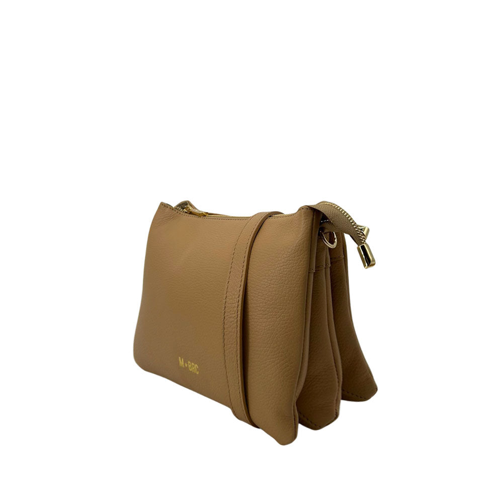 M BRC Onda shoulder bag for women, stylish leather accessory with curved wave design, black color, and adjustable strap.