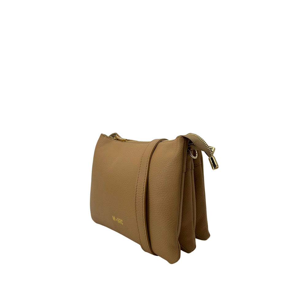 Mini shoulder bag by M BRC with wave pattern, black leather, and compact design, perfect for stylish everyday use.