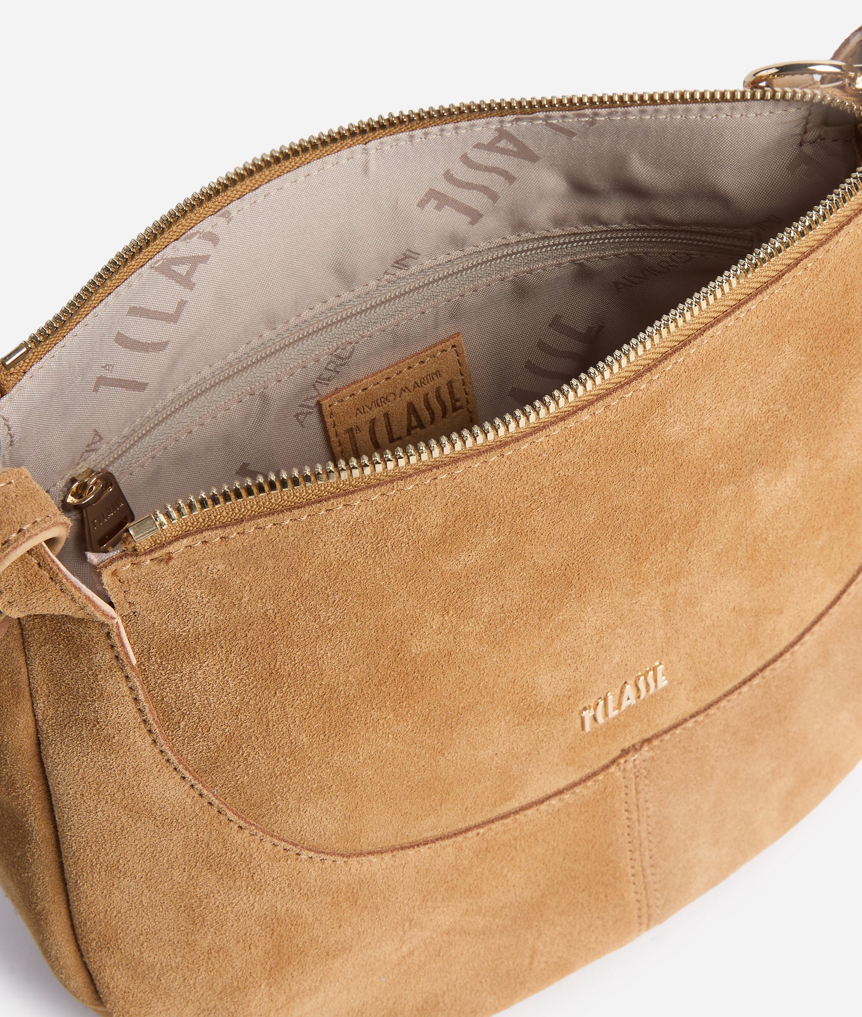 Alviero Martini 1ª Classe tribal-inspired mini crossbody bag with adjustable strap and signature print design.
