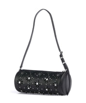 Borsa a spalla pelle Michael Kors Izzy Small nera cilindrica con motivo floreale traforato e strass applicati su sfondo bianco.