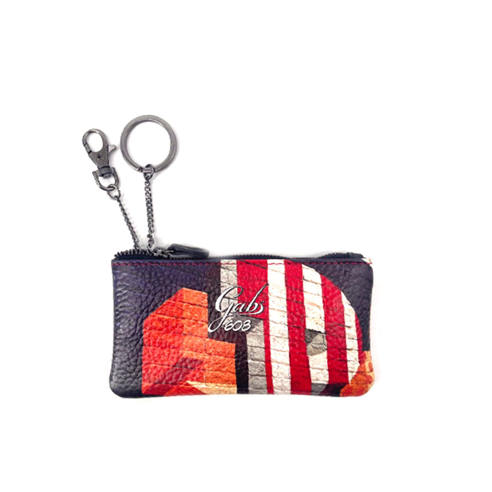 Gabs GKeyholder Plus women's keychain accessory with gold-tone hardware and branded logo detail.