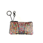 Gabs GKeyholder Plus women's keychain with gold-tone hardware and branded logo, attached to a set of keys.