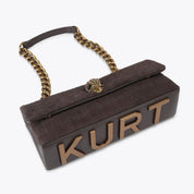 Borsa Kensington East West in pelle scamosciata con stampa coccodrillo Kurt Geiger