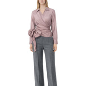 Vicolo women's blouse with bow detail, light fabric, long sleeves, and a stylish collar, perfect for casual or office wear.