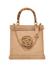 Medium pink LaMilanesa women's hand bag with top handles, stylish and elegant accessory for women.