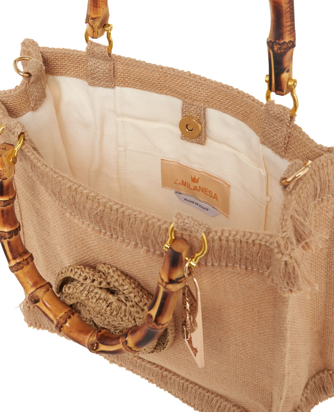 Medium pink LaMilanesa women's handbag with top handle, stylish accessory for everyday wear.