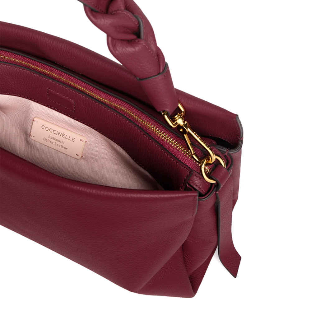 Medium Coccinelle Boheme shoulder bag made of leather, stylish women's accessory with a soft, structured design.