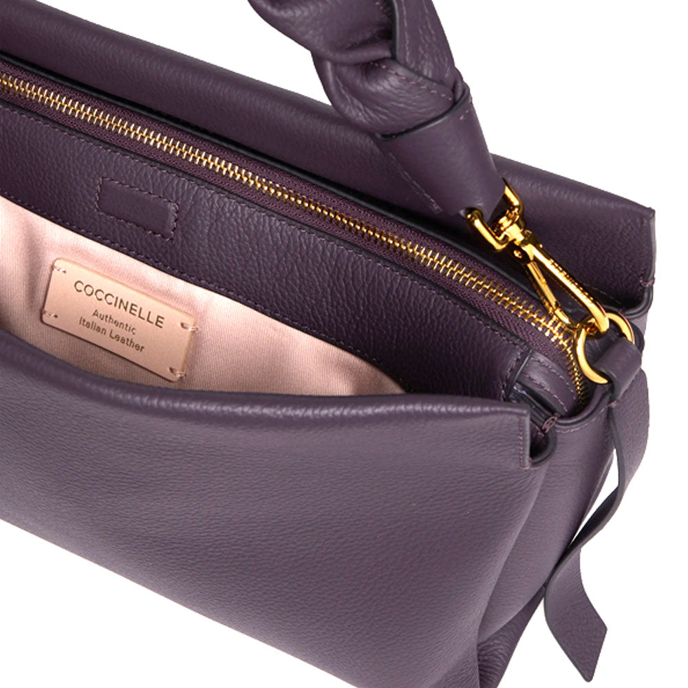 Medium Coccinelle leather boho shoulder bag with adjustable strap and stylish design, perfect for women's accessories.