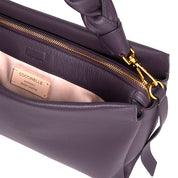 Medium Coccinelle leather boho shoulder bag with adjustable strap and stylish design, perfect for women's accessories.