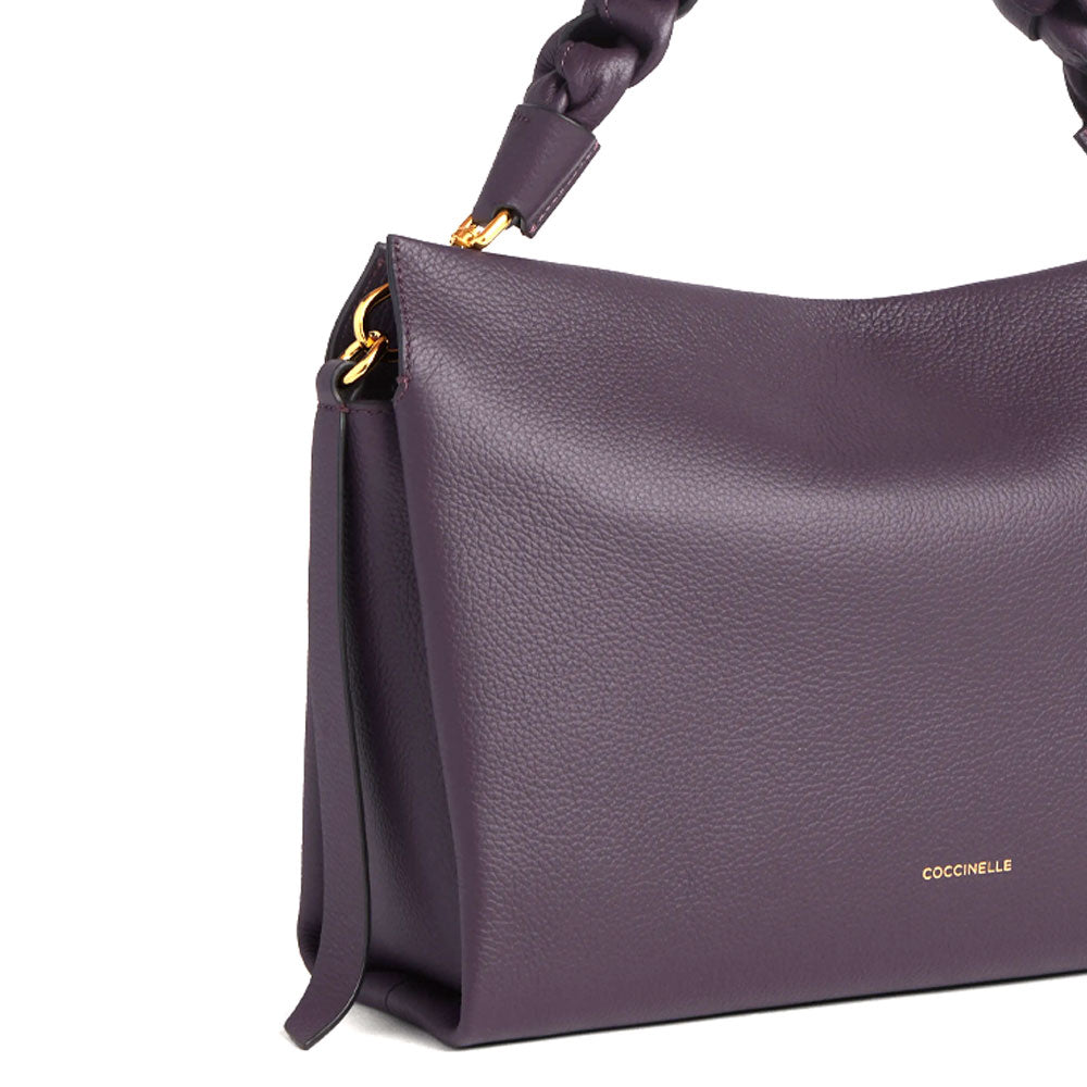 Medium bohemian leather shoulder bag by Coccinelle, featuring a stylish design and spacious interior for women.