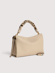 Medium leather Boheme shoulder bag by Coccinelle, stylish women's accessory with elegant design and spacious interior.