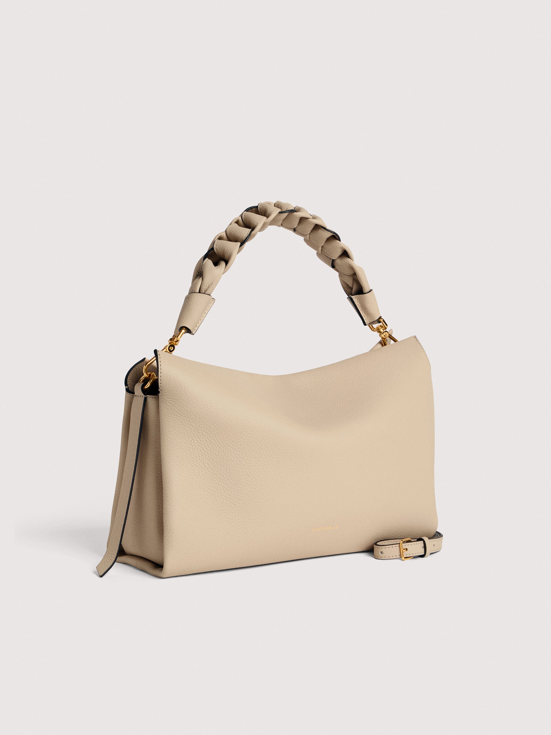 Medium leather Boheme shoulder bag by Coccinelle, stylish women's accessory with elegant design and spacious interior.