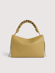 Medium Coccinelle Boheme shoulder bag in brown leather, stylish women's accessory with a chic design.