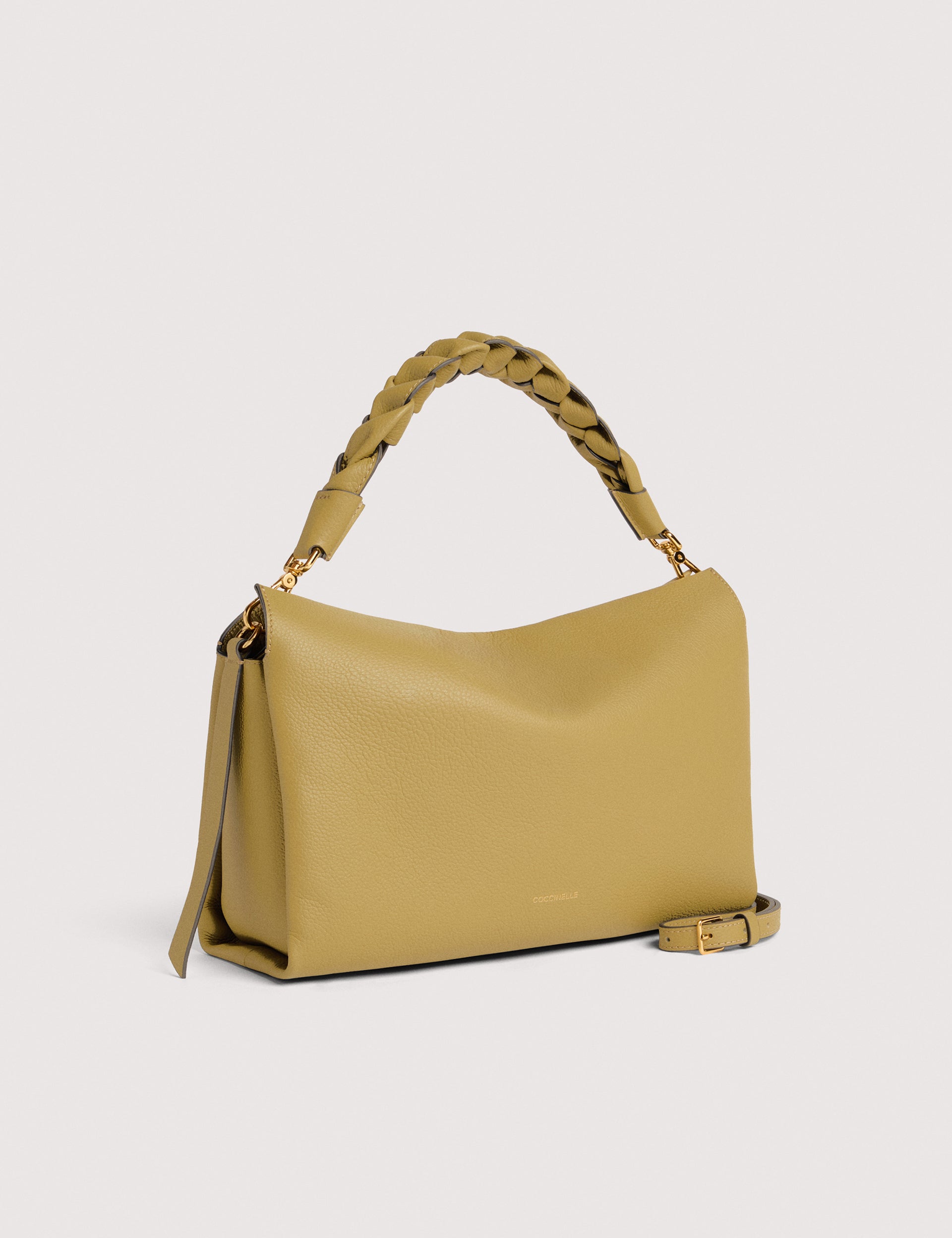 Medium Boheme shoulder bag in brown leather by Coccinelle, stylish accessory for women with adjustable strap and textured finish.