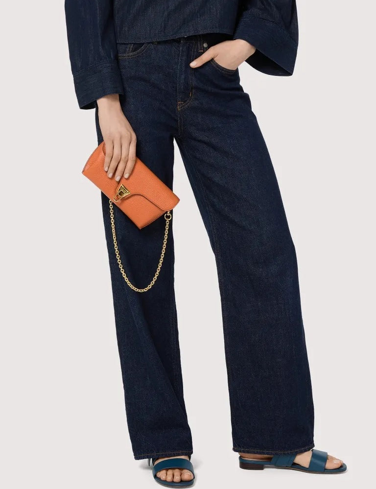 Coccinelle Double Beat shoulder bag in black leather, stylish accessory for women, featuring a sleek design and shoulder strap.