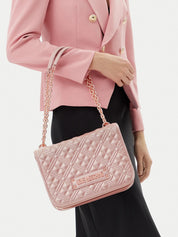 Love Moschino quilted shoulder bag for women, stylish accessory with a padded, textured design and silver chain strap.