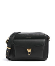 Large Coccinelle Beat Soft crossbody bag in soft leather, featuring a chic design and adjustable strap.