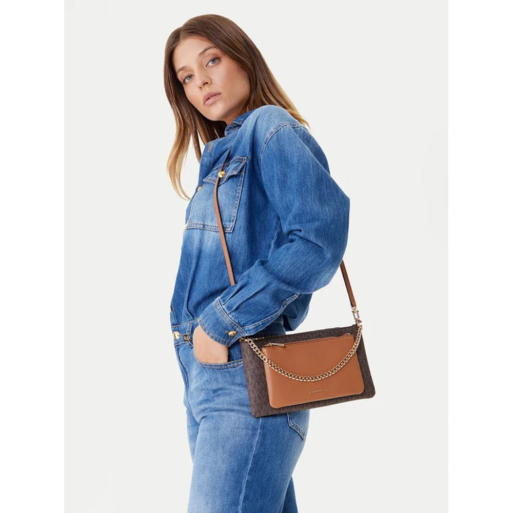 Medium Michael Kors Jet Set Borsa for women, stylish mini tote with gold hardware and signature logo, black leather finish.