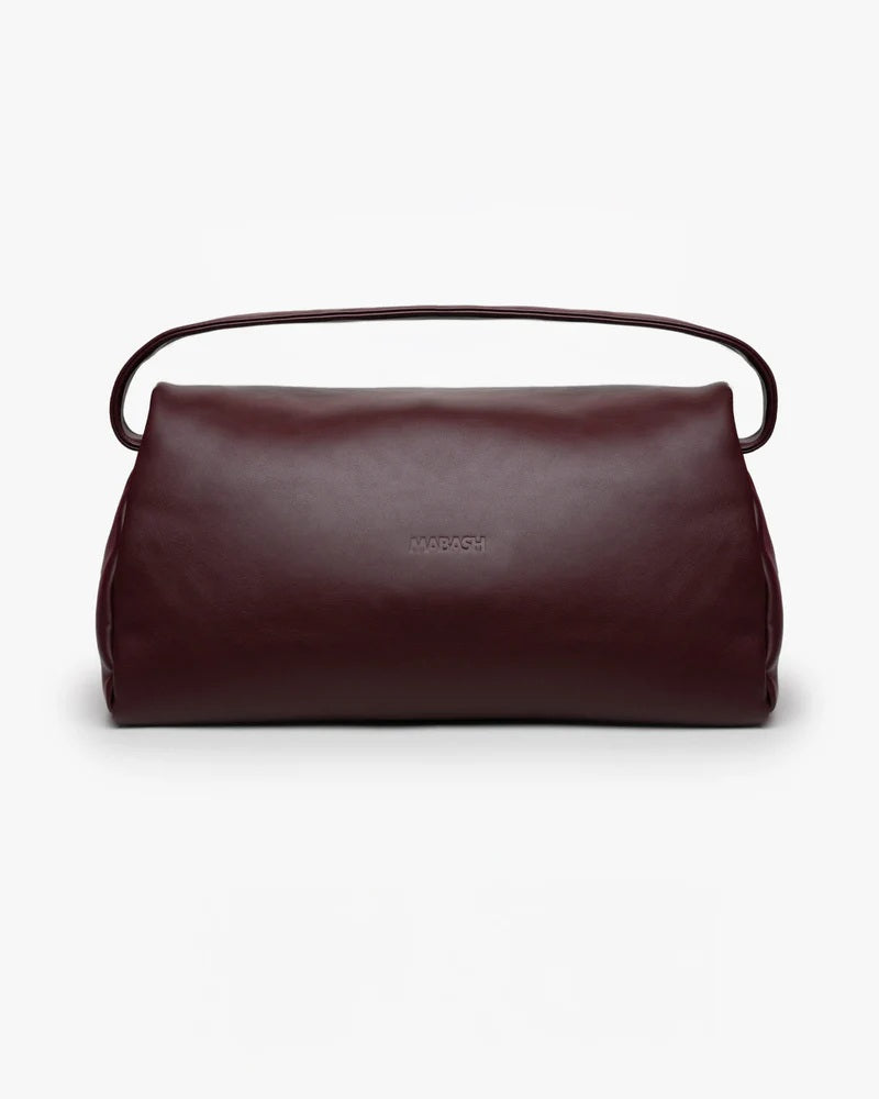 Borsa Puffy Mabash The New Deaux Mega color bordeaux in pelle vegana, vista frontale con manico.