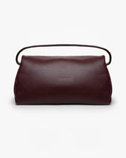 Borsa Puffy Mabash The New Deaux Mega color bordeaux in pelle vegana, vista frontale con manico.