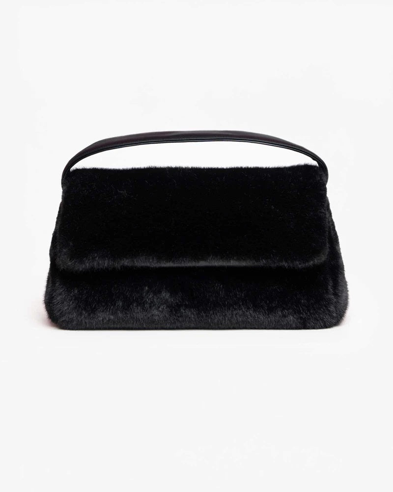 Borsa The Furry Puffy Mega Mabash nera, un'elegante Borsa in ecopelliccia con manico e patta frontale, fotografata su sfondo bianco.