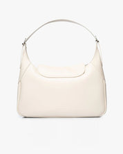 Borsa hobo pelle vegana color vaniglia, modello The Vanilla Hobo di Mabash, con manico regolabile e chiusura a patta vista frontalmente.