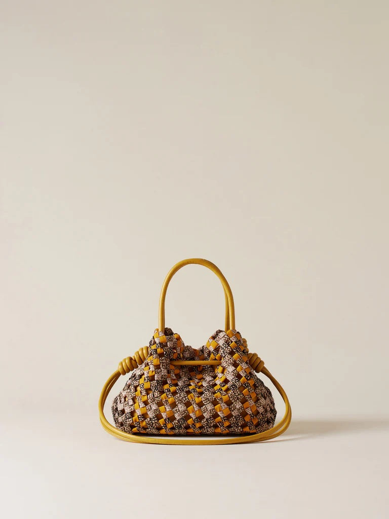 Small Borbonese La Nido shopping bag in beige with brown leather accents, stylish accessory for daily use.