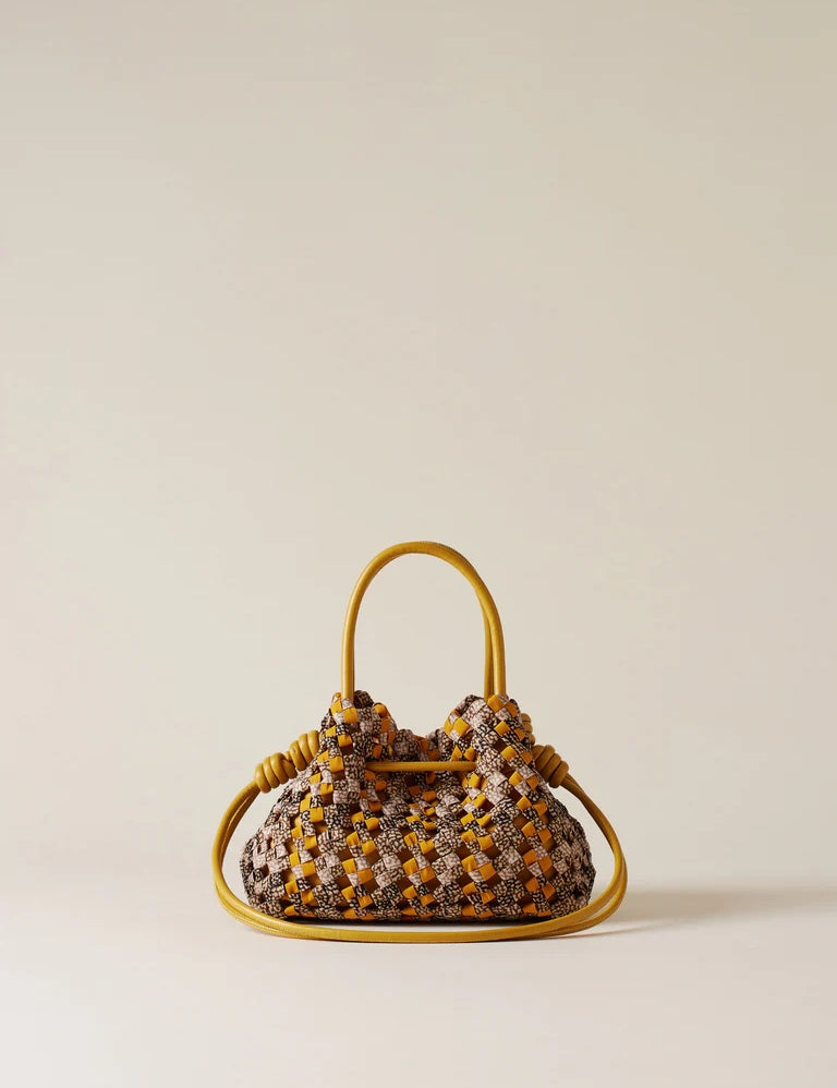 Small Borbonese La Nido shopping bag in beige with brown leather accents, stylish accessory for daily use.