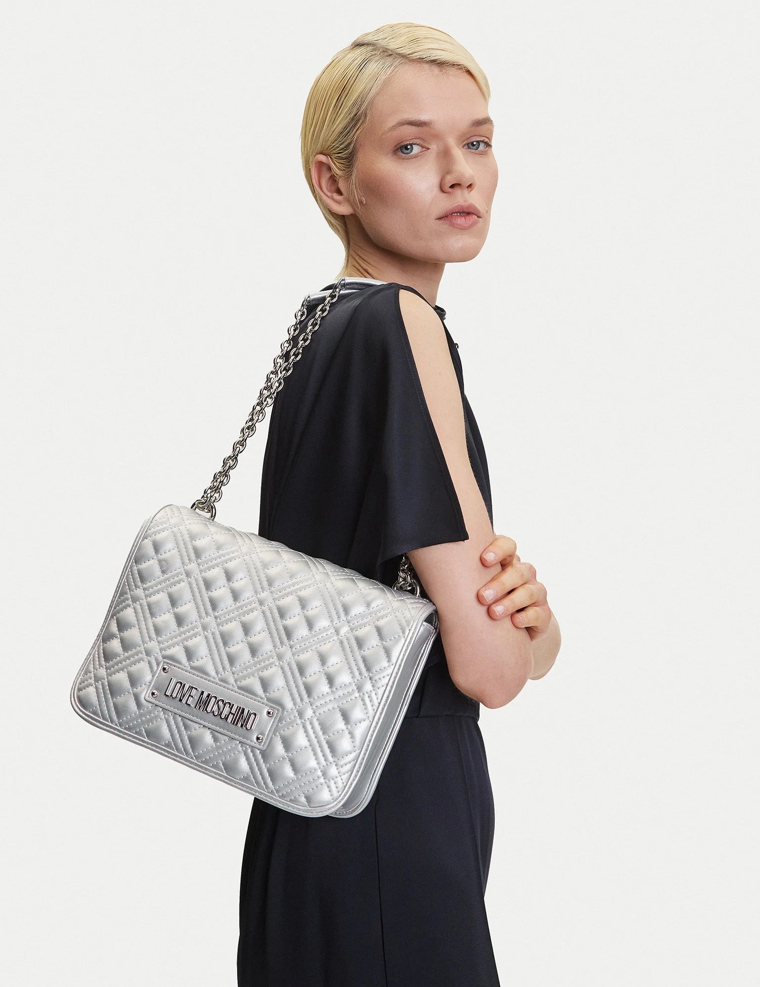 Love Moschino quilted shoulder bag with chain strap, stylish women's accessory in black with quilted pattern and logo detail.