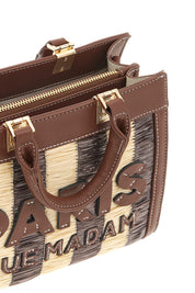Mini Tote bag in tan from Rue Madam, featuring sleek design and structured shape, perfect for stylish everyday use.