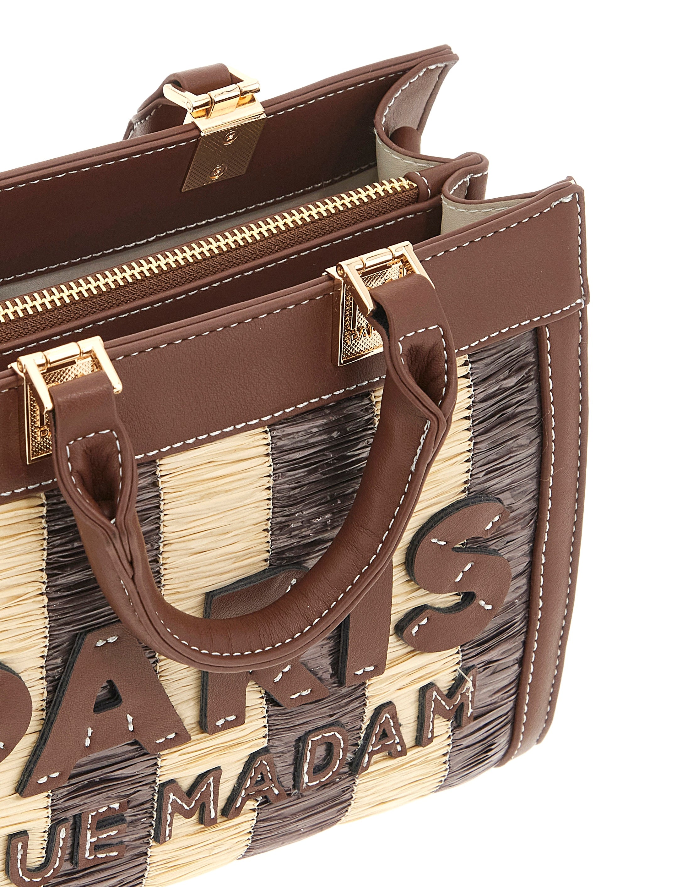 Mini Tote bag in tan from Rue Madam, featuring sleek design and structured shape, perfect for stylish everyday use.