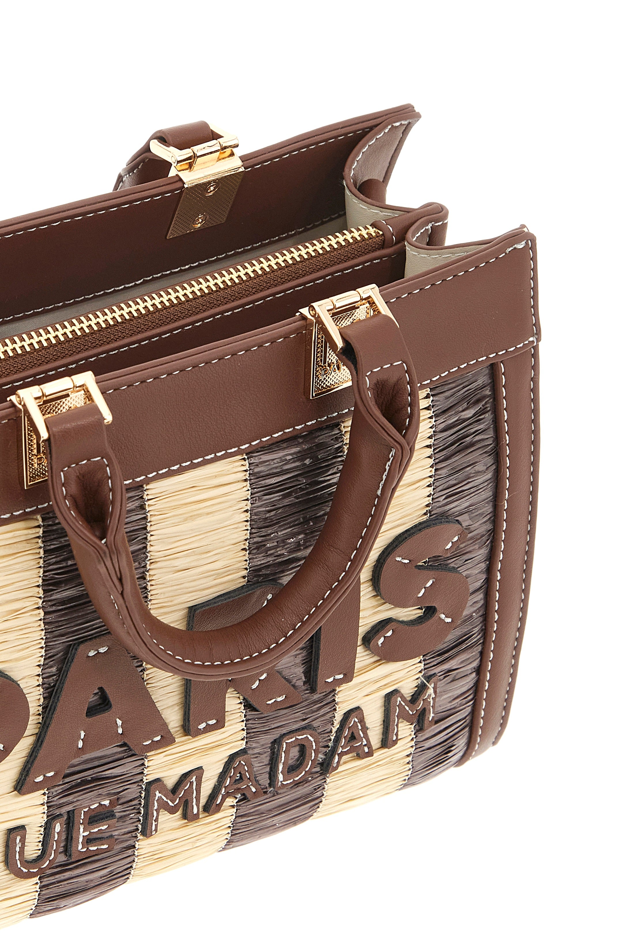 Mini Tote bag in tan from Rue Madam, featuring sleek design and structured shape, perfect for stylish everyday use.