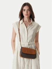 Small Michael Kors Alice Xbody bag for women, stylish mini shoulder bag with elegant design and adjustable strap.