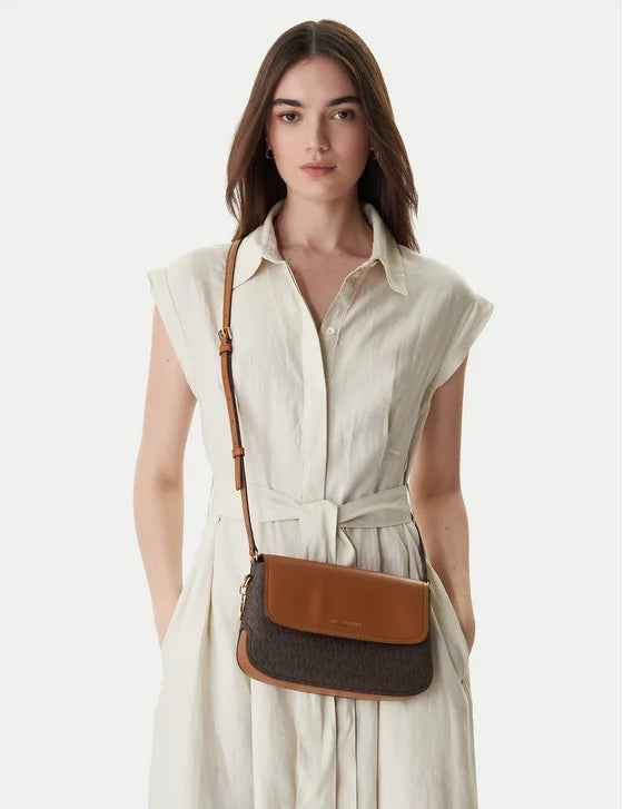 Small Michael Kors Alice Xbody bag for women, stylish mini shoulder bag with elegant design and adjustable strap.