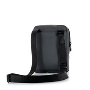 Piquadro men's iPad mini shoulder bag in black leather with adjustable strap and slim compact design.