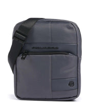 Piquadro men's iPad mini shoulder bag in black leather with adjustable strap and compact design.