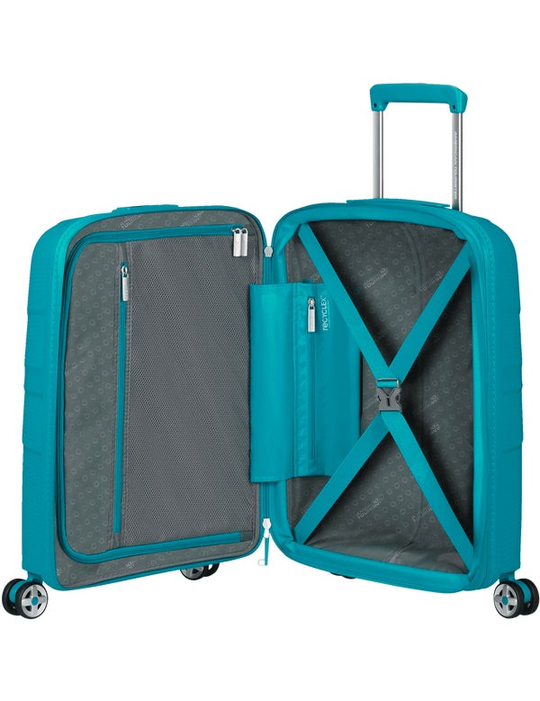 Expandable American Tourister Starvibe cabin trolley for travel, with multiple compartments and durable wheels.