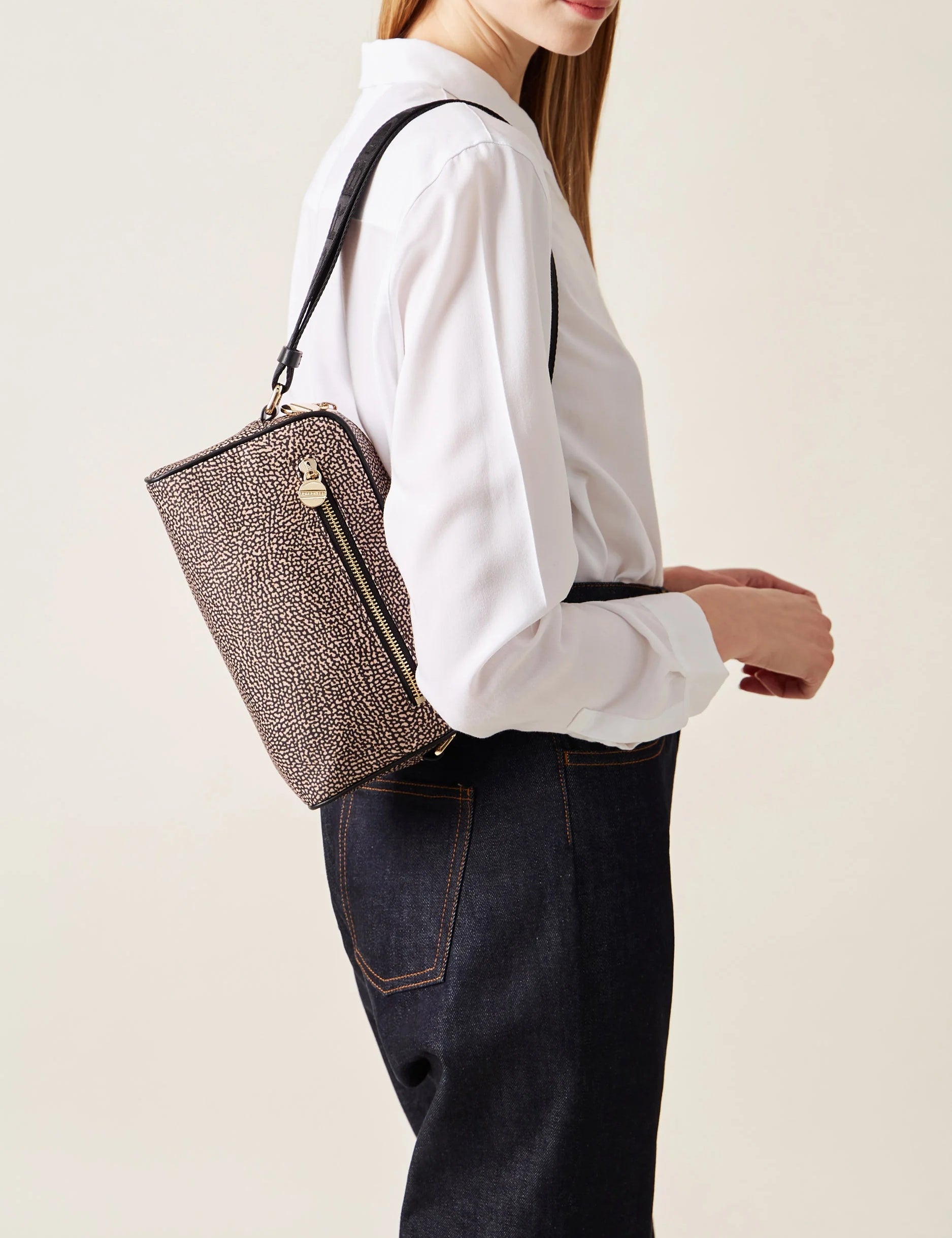 Small eco line Borbonese camera case, stylish and compact accessory for protecting your camera in a mini purse style.