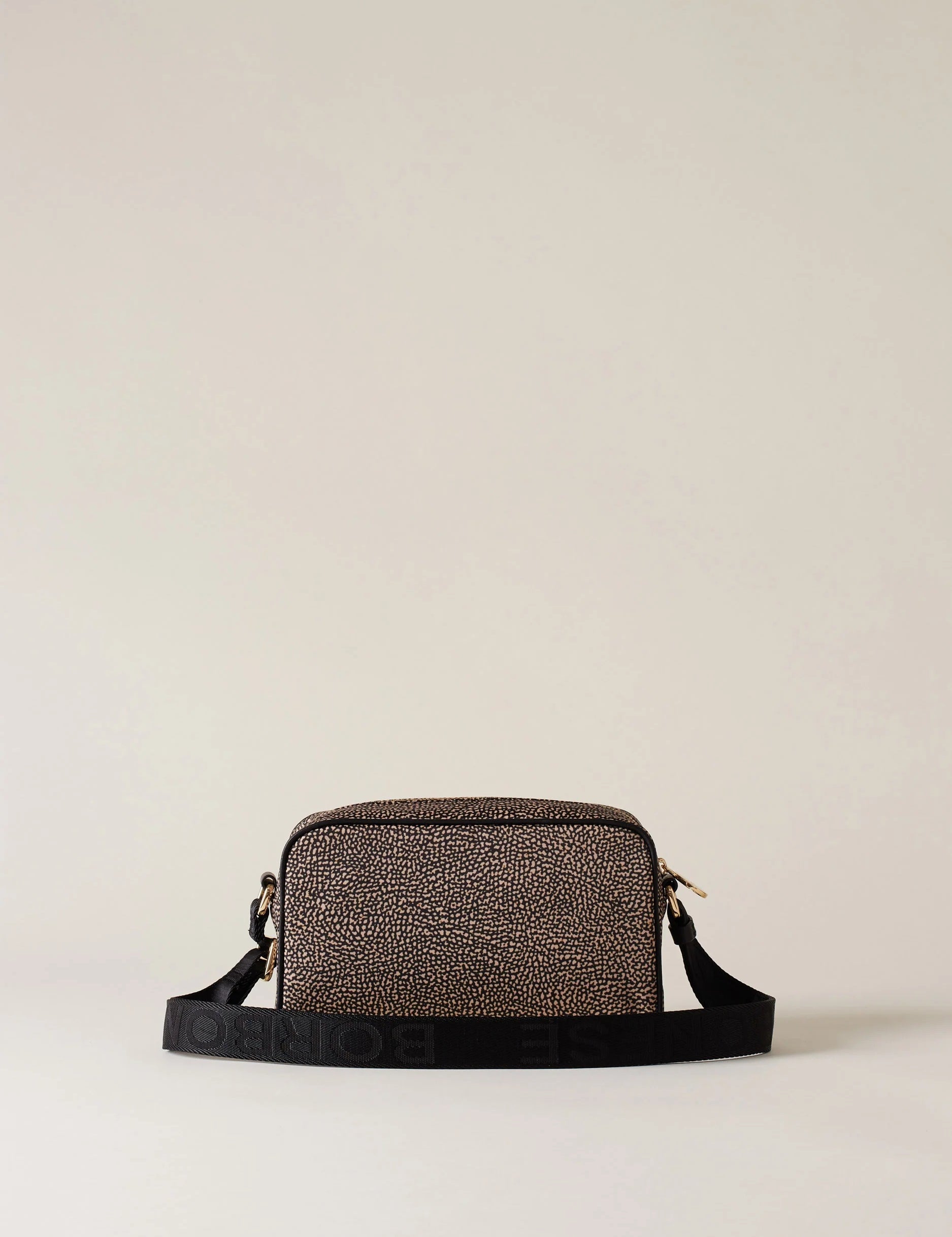 Small eco-friendly Borbonese camera case, stylish accessory for women, designed for compact cameras and everyday use.