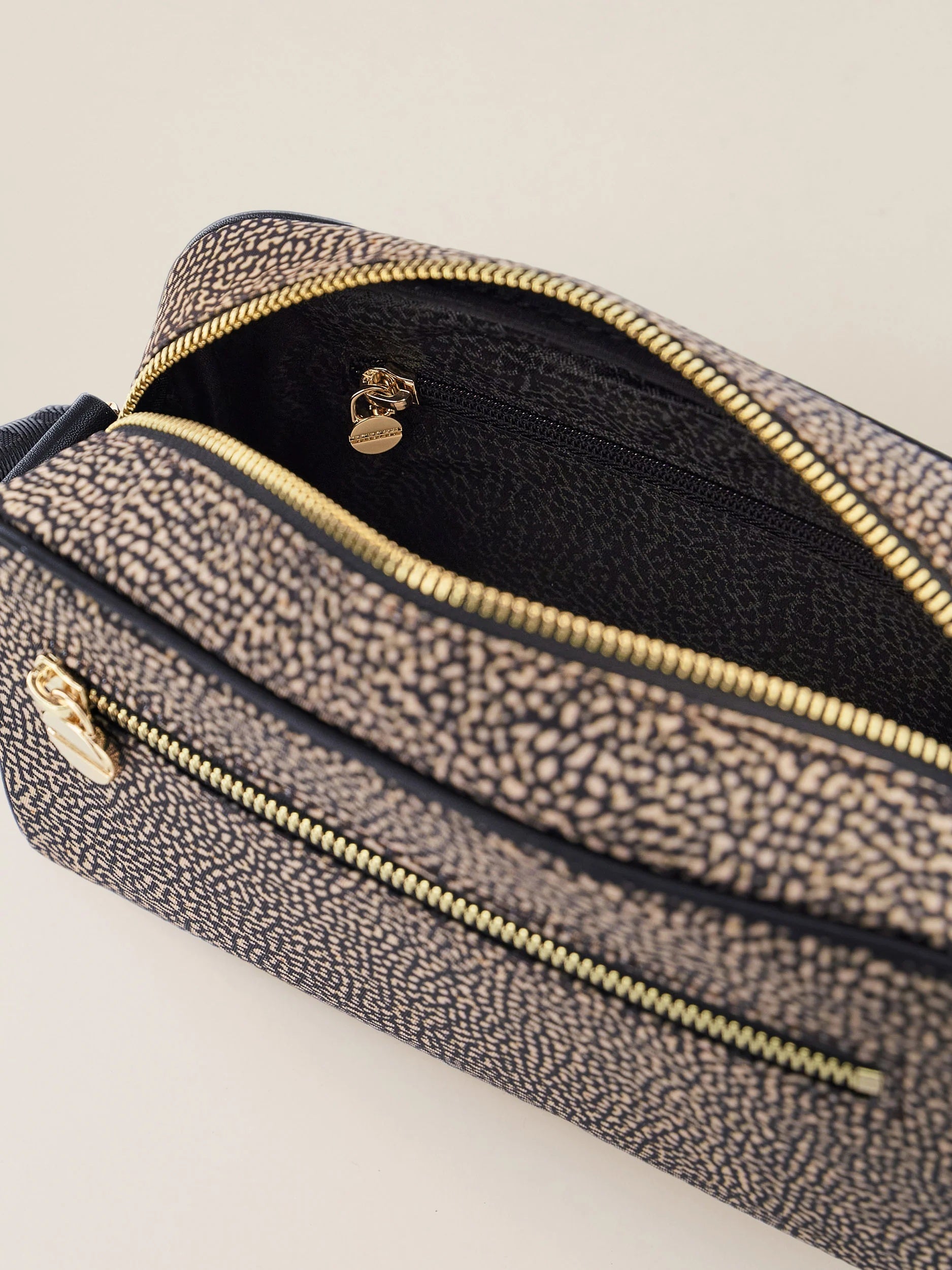 Small Borbonese Eco Line camera case, stylish and compact accessory for protecting cameras, designed for women.