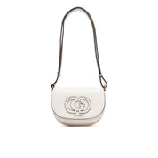 Mini crossbody bag by Guess in Calebra design, featuring a chic and compact style perfect for everyday use.
