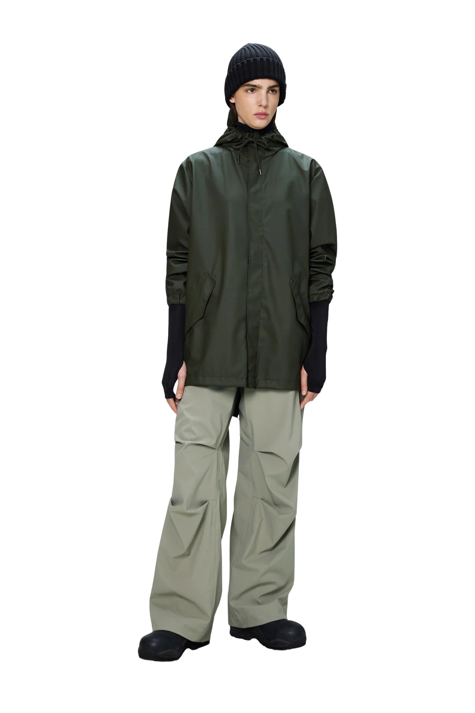 Unisex Rains fishtail jacket in waterproof fabric, featuring a sleek trench design with a hood and adjustable waist.